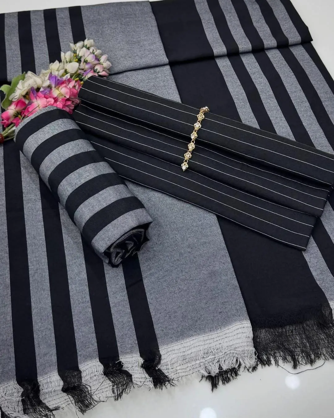 black women's unstitched Black Striped 3-Piece Khaadi Suit for Women — women handbags & dresses — The Queens — gallery image 2